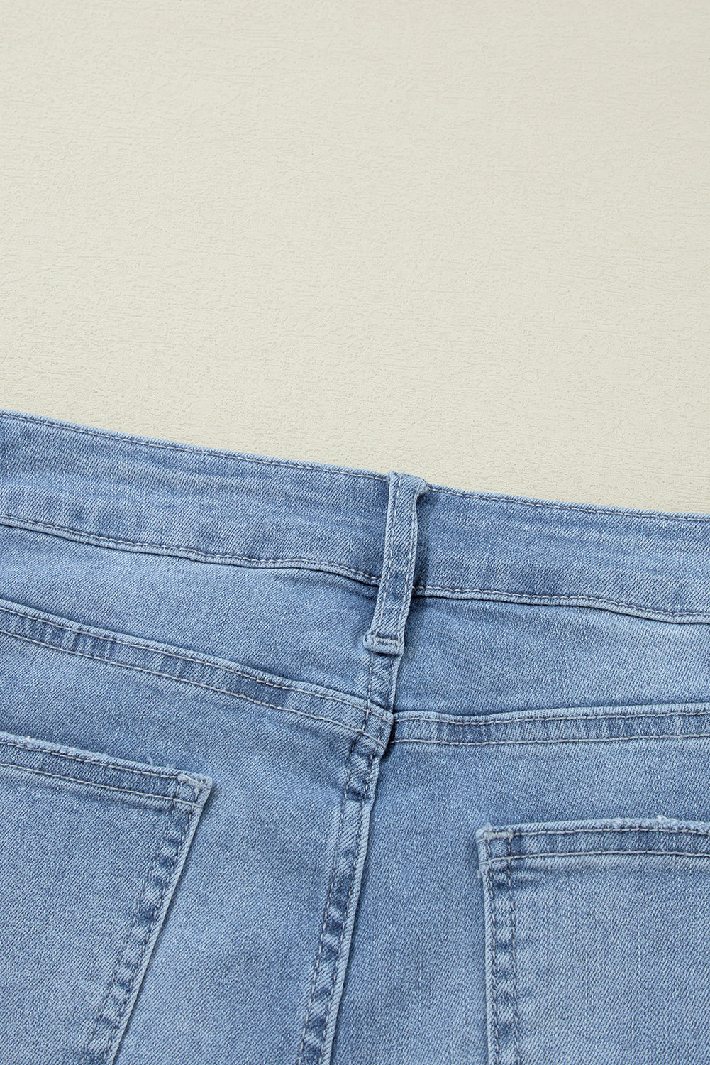 Dusk Blue High Rise Asymmetric Button Zip Fly Ripped Jeans - Glimmer Road