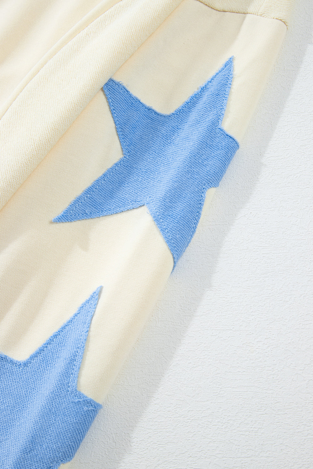 Beige Star Patchwork Exposed Seam Oversized Sweatshirt - Glimmer Road